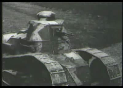 Primitive tanks advance over empty fields and berms, captioned "The tanks advance to do their bit."